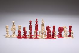 A 19TH CENTURY STAINED AND NATURAL BONE CHESS SET