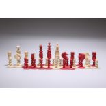 A 19TH CENTURY STAINED AND NATURAL BONE CHESS SET