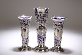 THREE VICTORIAN SILVER VASES, BY WILLIAM COMYNS, LONDON, ONE 1897 AND TWO 1899