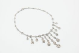 AN 18CT WHITE GOLD AND DIAMOND SET FRINGE NECKLACE