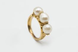 A CULTURED BAROQUE PEARL RING
