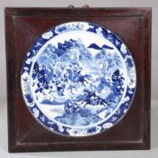 A CHINESE BLUE AND WHITE PORCELAIN WALL PLAQUE