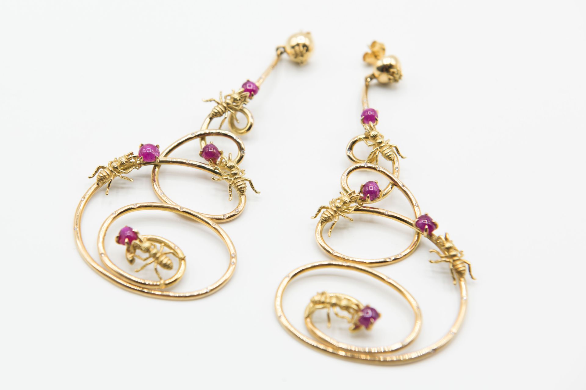 A PAIR OF CONTEMPORARY RUBY AND DIAMOND SET EARRINGS