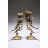 A PAIR OF 19TH CENTURY GILT-METAL MOUNTED HORNS ON STANDS
