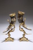 A PAIR OF 19TH CENTURY GILT-METAL MOUNTED HORNS ON STANDS