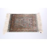 A TURKISH MINIATURE SILK PRAYER RUG