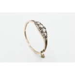 AN EARLY 19TH CENTURY DIAMOND SET BANGLE