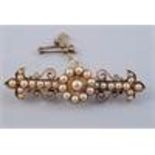 A LATE 19TH CENTURY PEARL SET BROOCH