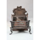 A VICTORIAN CAST IRON FIRE BASKET