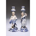 A PAIR OF ITALIAN PORCELAIN FIGURAL CANDLESTICKS, LATE 19th CENTURY