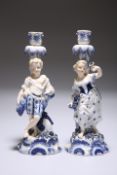 A PAIR OF ITALIAN PORCELAIN FIGURAL CANDLESTICKS, LATE 19th CENTURY