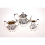 A THREE-PIECE VICTORIAN SILVER TEA-SERVICE, BY CHARLES REILY AND GEORGE STORER, LONDON, 1842