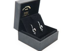A PAIR OF 14CT WHITE GOLD AND DIAMOND EARRINGS