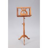 A REGENCY STYLE TEAK DOUBLE SIDED MUSIC STAND