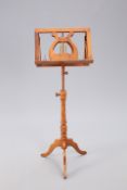 A REGENCY STYLE TEAK DOUBLE SIDED MUSIC STAND