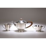 A THREE-PIECE GEORGE V SILVER TEA-SERVICE, BY EDWARD BARNARD AND SONS, LONDON, 1938