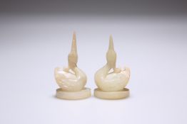 A PAIR OF CHINESE CARVED HARDSTONE MODELS OF CRANES