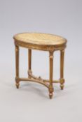 A LOUIS XVI STYLE GILTWOOD AND CANEWORK STOOL, 19TH CENTURY