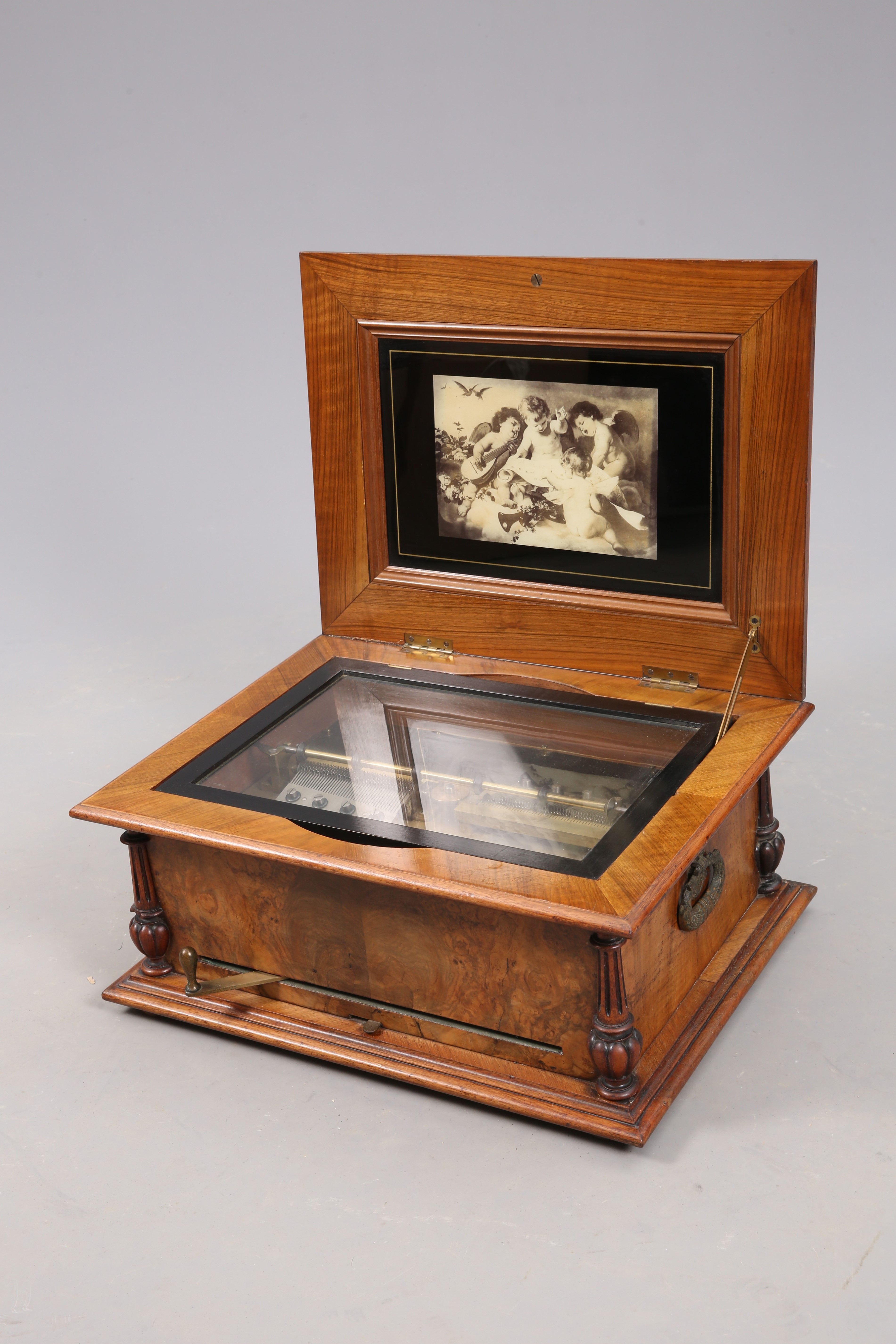 A WALNUT CASED POLYPHON DISC MUSIC BOX