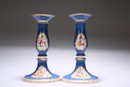 A PAIR OF ENGLISH PORCELAIN CANDLESTICKS