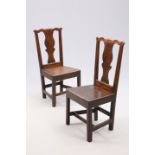 A PAIR OF COUNTRY CHIPPENDALE OAK SIDE CHAIRS