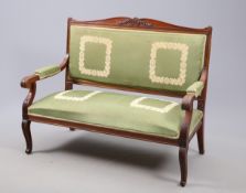 A CONTINENTAL MAHOGANY AND UPHOLSTERED CANAPE, 19TH CENTURY