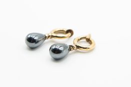 A PAIR OF 18CT YELLOW GOLD AND HEMATITE EARRINGS BY DEAKIN AND FRANCIS