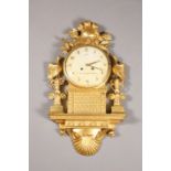 A SWEDISH NEOCLASSICAL GILTWOOD WALL CLOCK