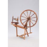 A VICTORIAN PINE SPINNING WHEEL