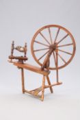 A VICTORIAN PINE SPINNING WHEEL