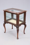 A LATE VICTORIAN WALNUT BIJOUTERIE CABINET