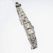 AN ART DECO 14K WHITE GOLD AND DIAMOND SET COCKTAIL WATCH