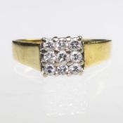 AN 18CT YELLOW GOLD AND DIAMOND CLUSTER SIGNET RING