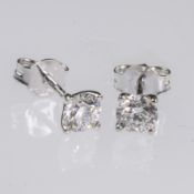 A PAIR OF 18CT CARAT WHITE GOLD BRILLIANT CUT DIAMOND EARRINGS