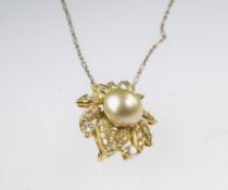 A CULTURED PEARL AND DIAMOND PENDANT