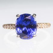 AN 18CT ROSE GOLD AND PLATINUM SYNTHETIC SAPPHIRE AND DIAMOND RING