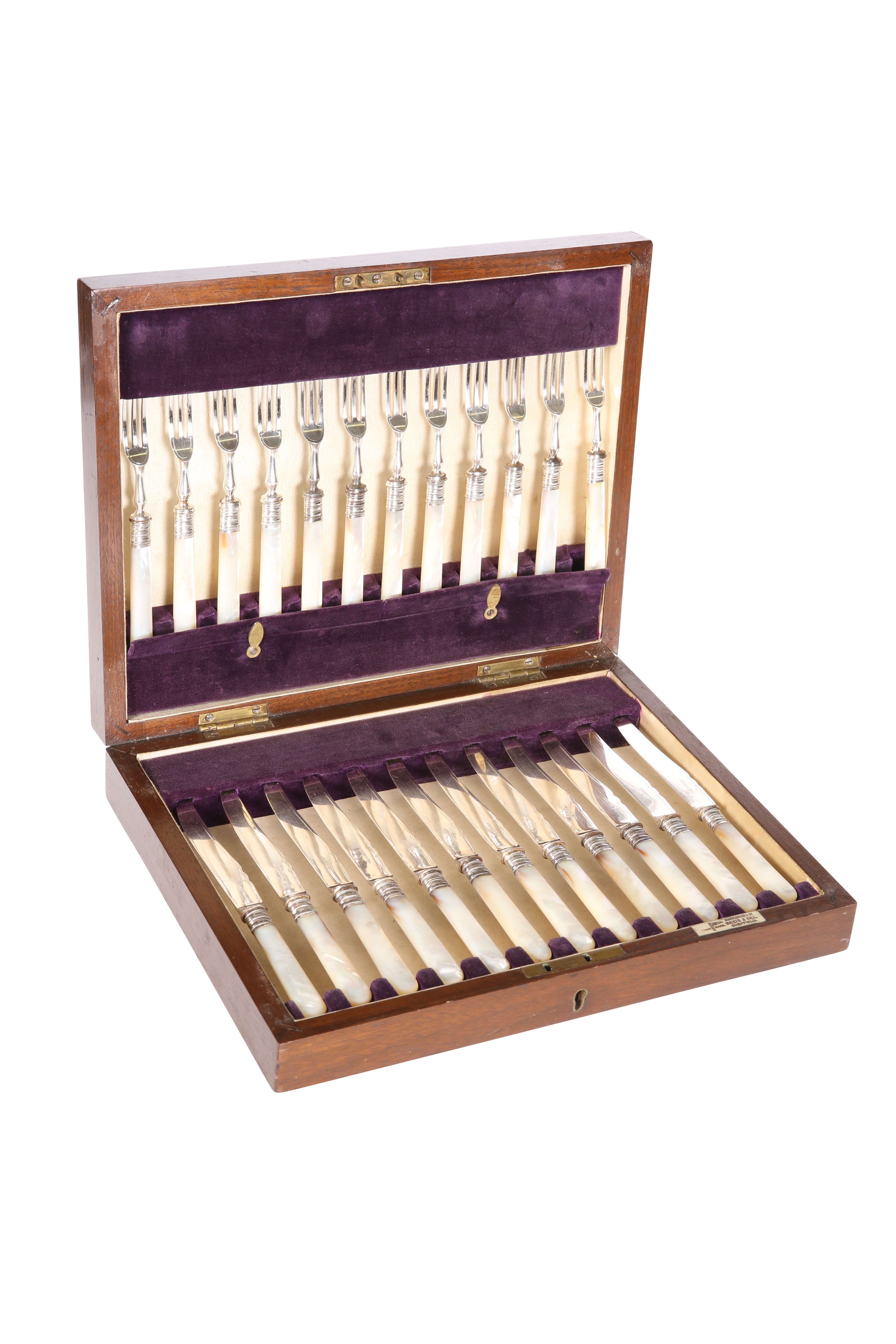 A CASED SERVICE OF TWELVE MOTHER-OF-PEARL HANDLED SILVER-PLATED FRUIT KNIVES AND FORKS