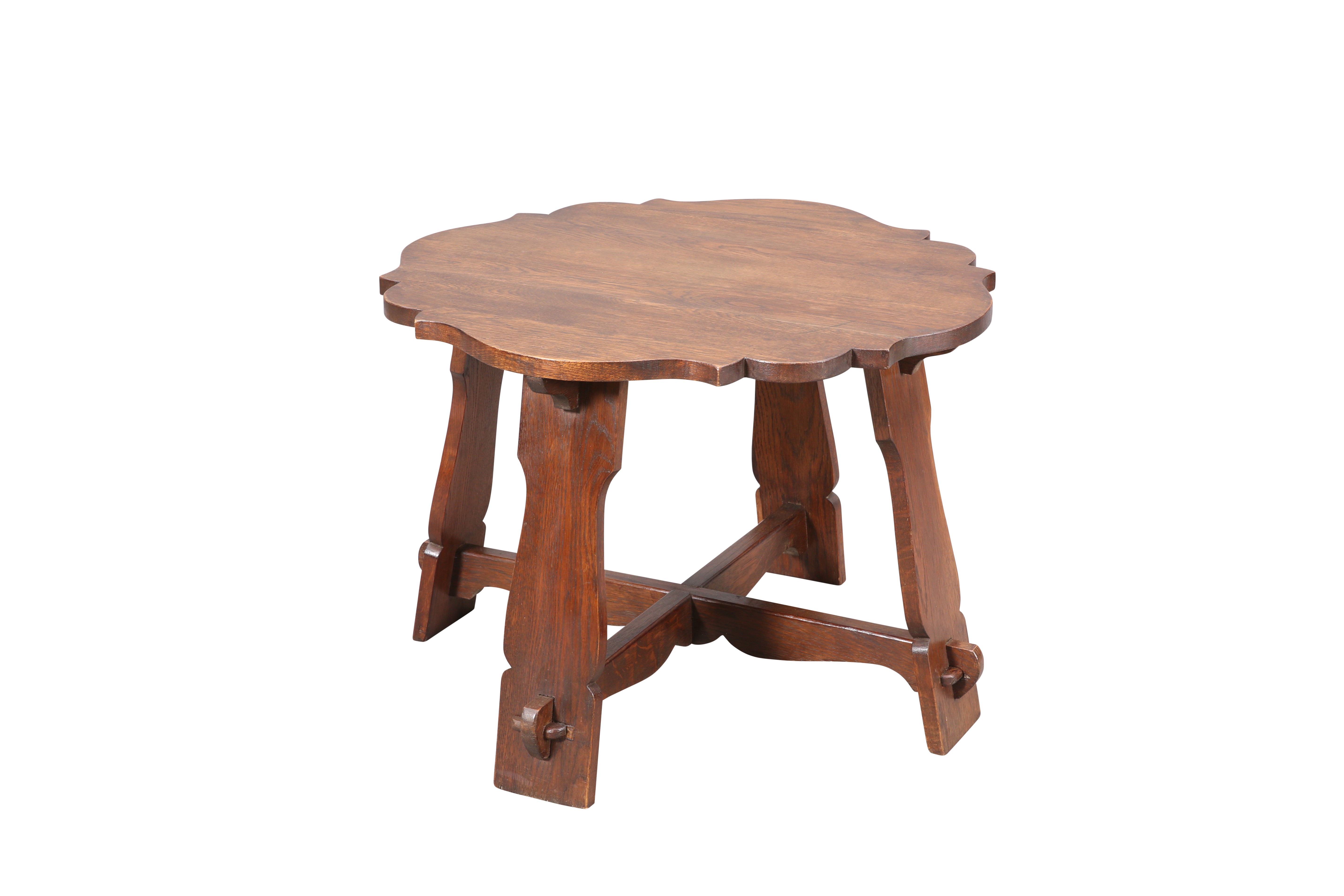 AN ARTS AND CRAFTS OAK OCCASIONAL TABLE