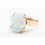 A 9CT YELLOW GOLD AND OPAL RING