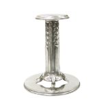 A LIBERTY & CO TUDRIC PEWTER CANDLESTICK, DESIGNED BY ARCHIBALD KNOX