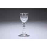 AN 18TH CENTURY ENGRAVED WINE GLASS