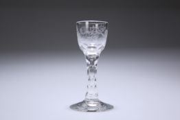 AN 18TH CENTURY ENGRAVED WINE GLASS