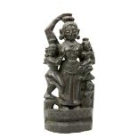 A CARVED WOODEN FIGURE OF A DEITY AND ATTENDANTS