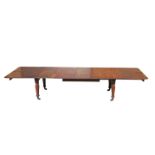 A LARGE MAHOGANY TELESCOPIC DINING TABLE, FIRST HALF 19TH CENTURY