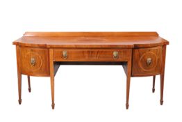 A GEORGE III INLAID MAHOGANY BREAKFRONT SIDEBOARD