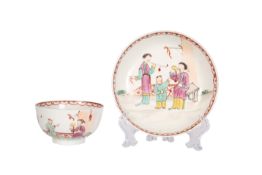 A LOWESTOFT LADY WITH A MIRROR MANDARIN TEA BOWL AND SAUCER, c .1780