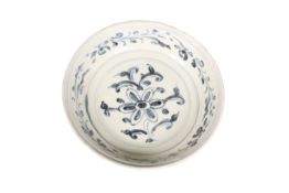 A CHINESE PROVINCIAL BLUE AND WHITE POTTERY BOWL