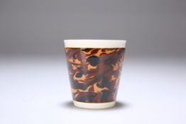 A MOCHA WARE TORTOISESHELL PATTERN TUMBLER CUP