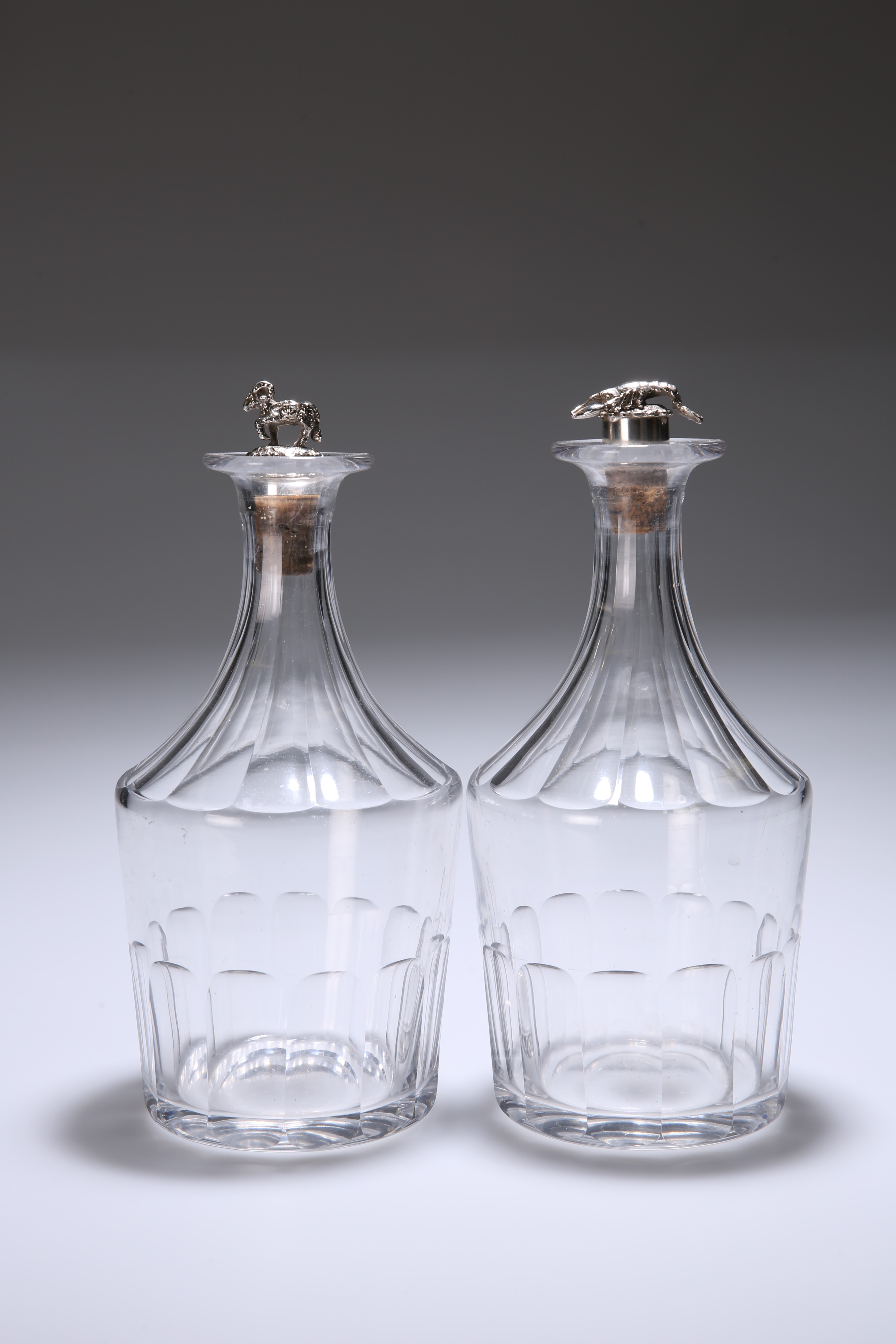 A PAIR OF REGENCY CUT-GLASS DECANTERS