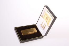 A DUNHILL GOLD-PLATED LIGHTER